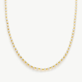 Gold Pearl Beaded Necklace, a chic combination of pearls and gold, creating a stylish and versatile accessory that enhances your ensemble with timeless sophistication