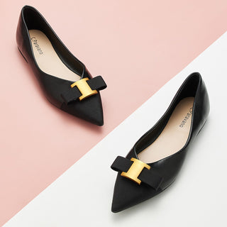 Sleek Sophistication: Embellished Black Leather Flats, featuring stylish details for a polished look