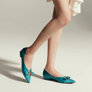 "Peacock Inspired Beauty: Peacock Blue Embellished Leather Flats, a vibrant and exotic choice for a bold and stylish look.