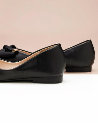 Elegant women's footwear in black with a metal bowknot accent.