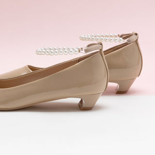 Versatile Neutrals: Beige Pearl Straps Low Heel, offering a subtle and stylish touch to any outfit