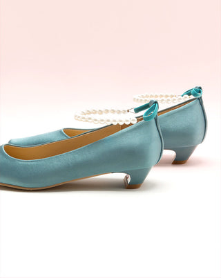 Charming Blue Heels adorned with Pearl Straps