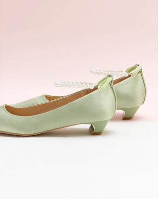 Sleek Green Heels adorned with Pearl Accents