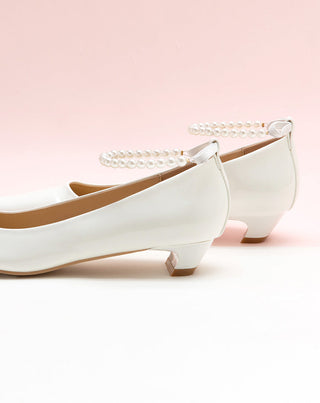 Chic White Heels adorned with Pearl Accents