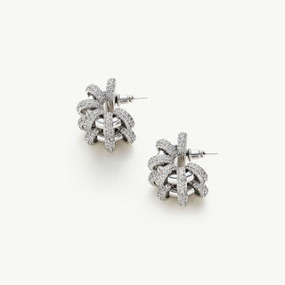 Coiled Double Earrings, showcasing an elegant double coil design, these earrings add a touch of sophistication and modern style to your ear ensemble