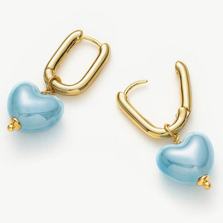 Ceramics Heart Hoop Earrings in a serene shade of blue, offering graceful loops of serenity that enhance your style with a tranquil and chic vibe