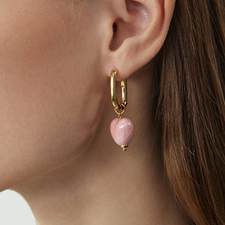 Heart Hoop Earrings with a pretty pink hue, showcasing the elegance of ceramics in heart shapes for a delightful and stylish appearance.