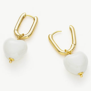 Ceramics Heart Hoop Earrings in a serene shade of white, offering graceful loops of serenity that enhance your style with a pure and chic vibe