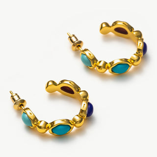 Medium Hoop Earrings featuring a medley of vivid gemstones, radiating a captivating and dynamic aura that adds flair to your ensemble