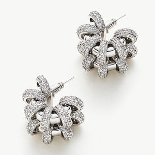 Coiled Double Earrings with a double helix design, these hoops bring a chic and trendy twist to your style, making them a fashionable addition to your jewelry collection