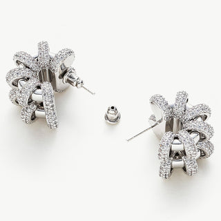 Coiled Double Earrings creating timeless loops of coiled charm, these earrings offer a classic and versatile accessory that complements any outfit with grace.