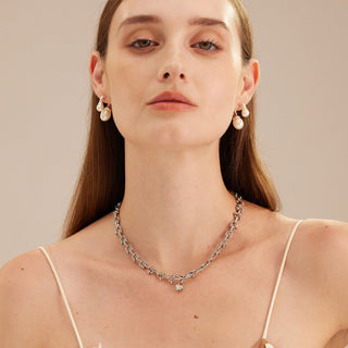 Heart Diamond Chain Necklace in Platinum, an elegant embrace of love and luxury, this necklace features linked hearts adorned with diamonds, set in a luminous platinum chain, making it a meaningful and stylish addition to your jewelry collection.