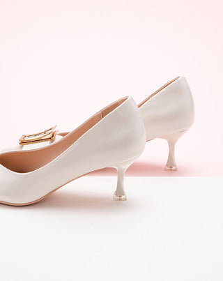    Stylish-white-buckled-pumps_-offering-a-vibrant-and-fashionable-choice-for-your-footwear-collection